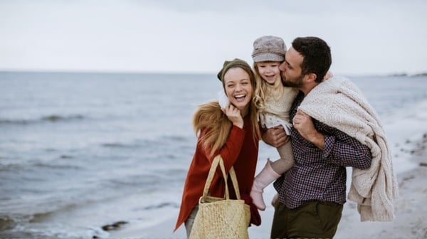 Young family by the sea